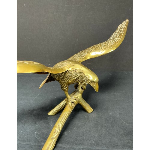 54 - Two Brass Supermarine Ash Trays - together with a large brass eagle

Postage band B