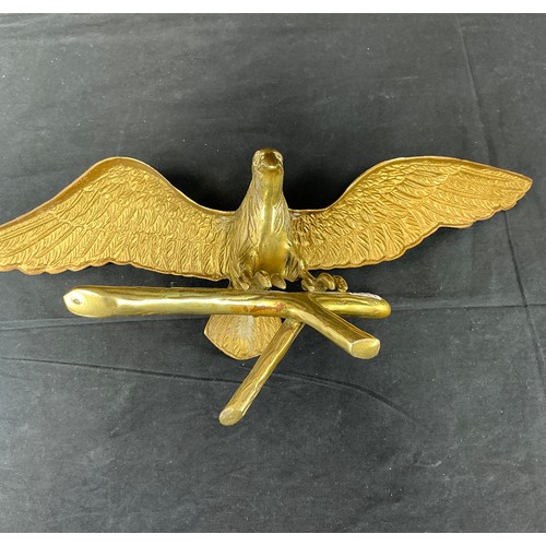 54 - Two Brass Supermarine Ash Trays - together with a large brass eagle

Postage band B