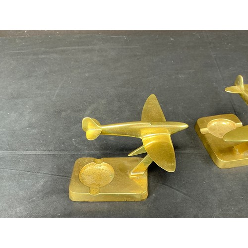 54 - Two Brass Supermarine Ash Trays - together with a large brass eagle

Postage band B