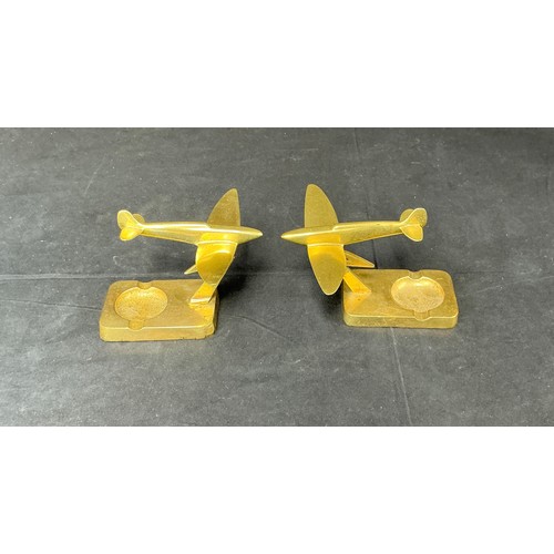 54 - Two Brass Supermarine Ash Trays - together with a large brass eagle

Postage band B