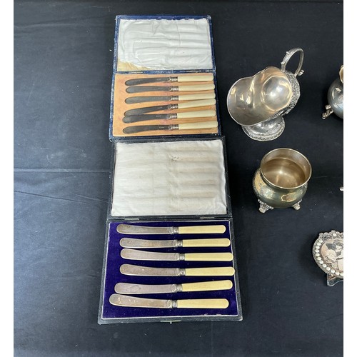 52 - Silver Plate adn EPNS Items - to include 2 boxed sets of butter knives, small picture frame. Heavy w... 