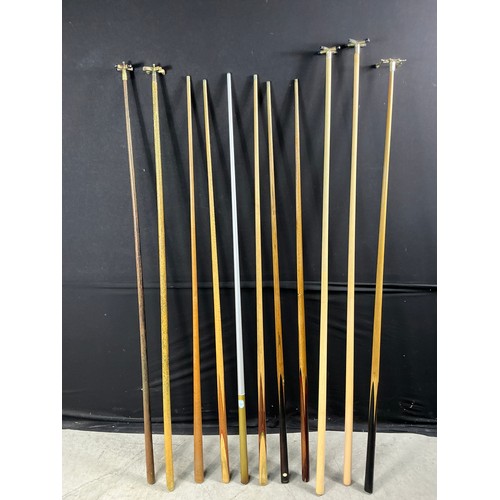 1 - Approx 20 Snooker Cues, long reach cues and Rests - ranging from vintage 40's to modern day

Collect... 