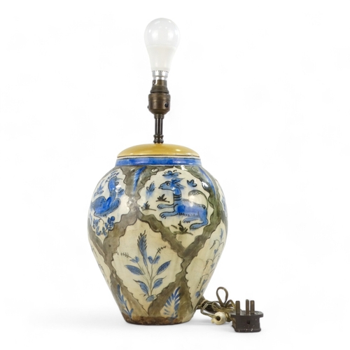 12 - A 19th century Iznik vase - now as a table lamp and decorated with birds and flowers, 41cm high.