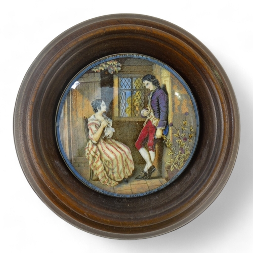 14 - A 19th century Prattware pot lid - view of Pegwell Bay, 10cm diameter, within a wooden frame, togeth... 