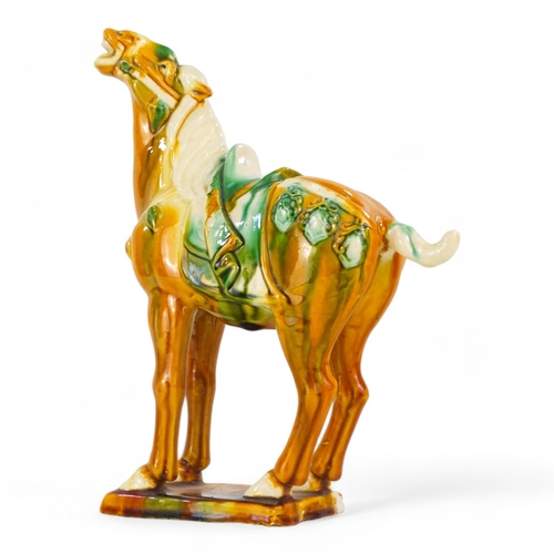 155 - A 20th century Sancai glazed model of a horse - in the Tang style, standing on rectangular base, 20c... 