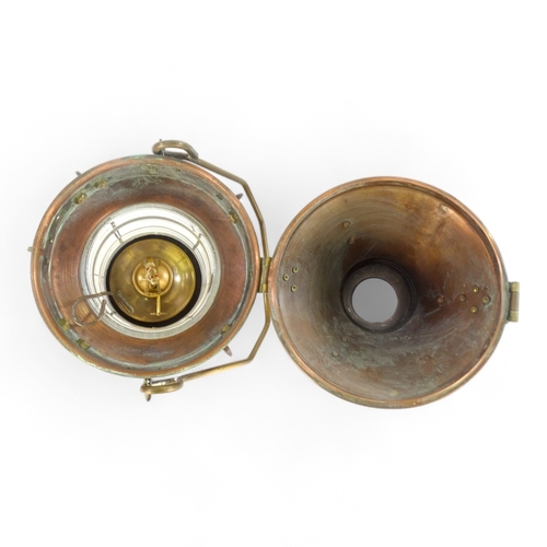 2 - An early 20th century copper and brass mast head lamp - of typical form and including original burne... 