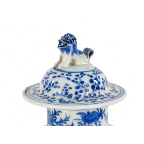 264 - A late 19th century Chinese blue and white vase - lidded and of baluster form and decorated with fig... 