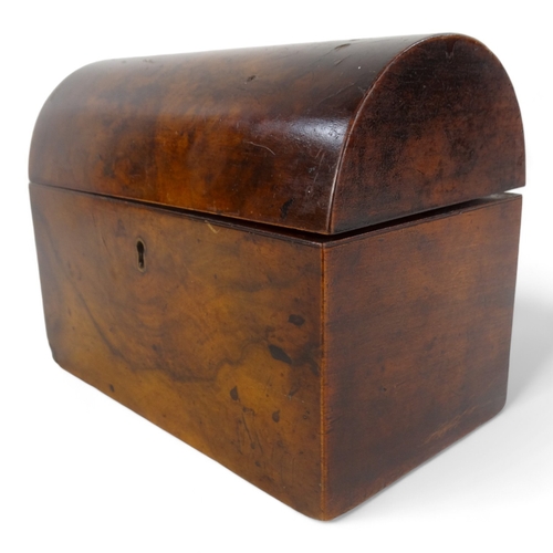 6 - A late 19th century walnut tea caddy - of casket form, the interior with two divisions, 20cm wide.