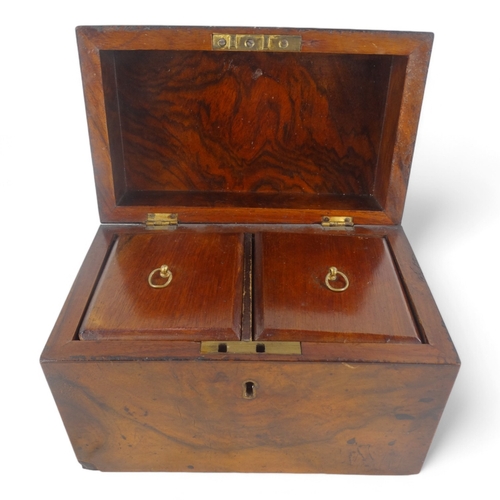 6 - A late 19th century walnut tea caddy - of casket form, the interior with two divisions, 20cm wide.