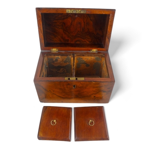 6 - A late 19th century walnut tea caddy - of casket form, the interior with two divisions, 20cm wide.