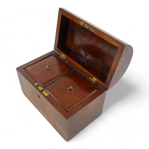 6 - A late 19th century walnut tea caddy - of casket form, the interior with two divisions, 20cm wide.