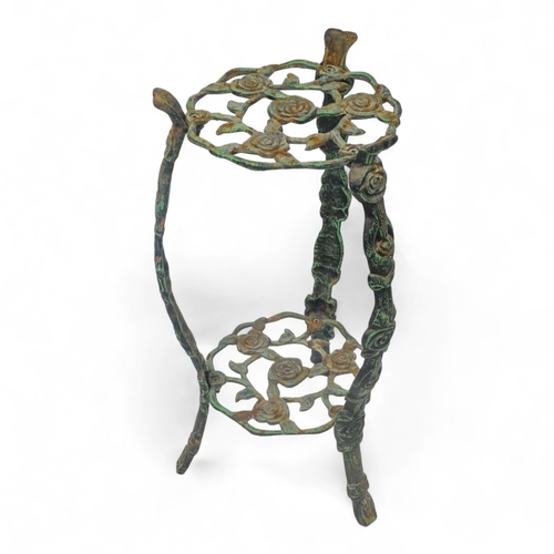 101 - A metal jardiniere stand - decorated with roses, height 69cm.