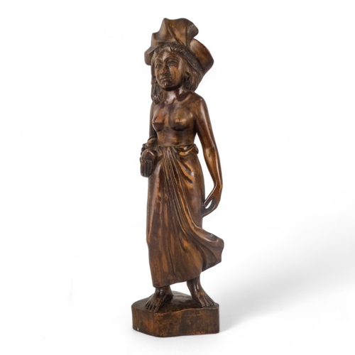 105 - An African hardwood mask - height 28cm, together with an African hardwood figure of a woman, height ... 