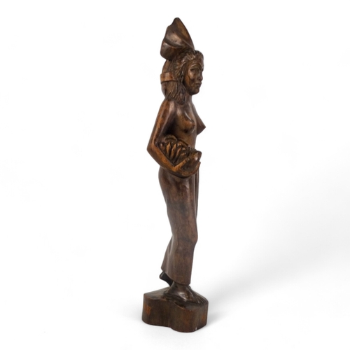 105 - An African hardwood mask - height 28cm, together with an African hardwood figure of a woman, height ... 