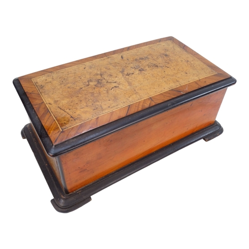 10A - A 19th century Swiss cylinder music box - walnut and amboyna veneered box, the cylinder playing six ... 