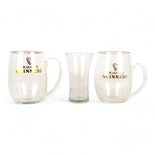 113 - Two Guinness branded three pint jugs - together with a pint glass from the Oddfellows Inn - Falmouth... 