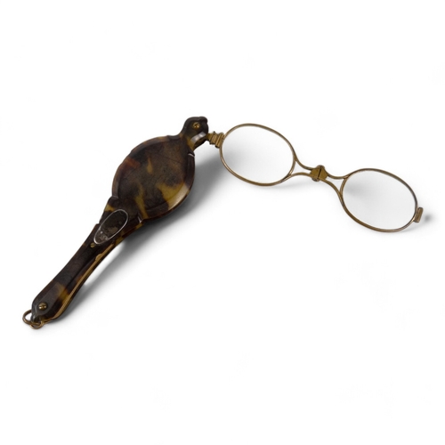 122 - A pair of gilt rimmed pince-nez - together with a pair of lorgnettes and a paper knife. (3)