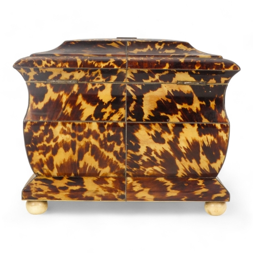 129 - A late George III tortoiseshell tea caddy - of rectangular casket form with a two division interior,... 