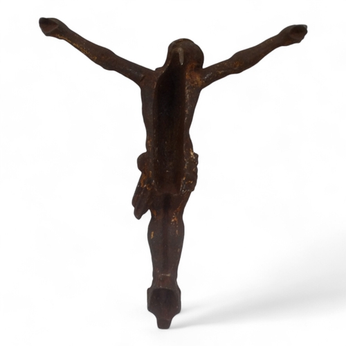 131 - A cast iron figure of Christ on the cross - height 44cm.