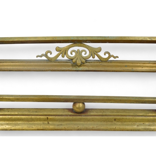 135 - Two brass fenders - largest width 130cm, depth 28cm, together with a pair of wooden bellows carved w... 