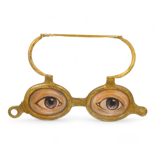 141 - A late 19th century French opticians shop sign - gilt and polychrome painted, modelled as a pair of ... 