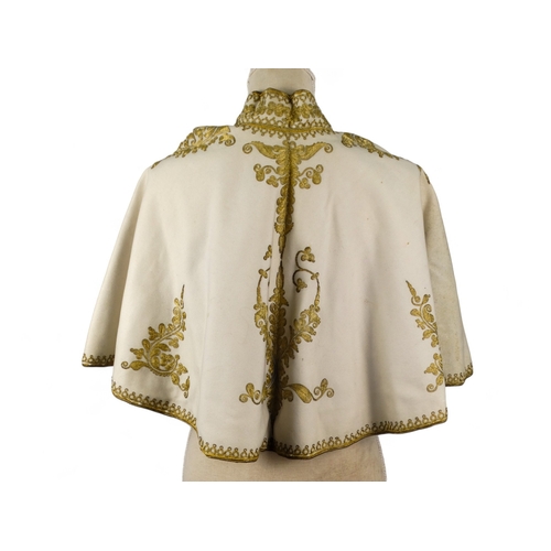 150 - An early 20th century grey wool and gilt embroidered cape - with upstanding collar decorated foliage... 