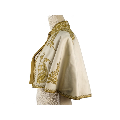 150 - An early 20th century grey wool and gilt embroidered cape - with upstanding collar decorated foliage... 