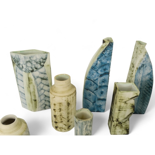 177 - A collection of Carn Pottery - including a tall tapered vase signed John Beusman to base, 27cm high,... 