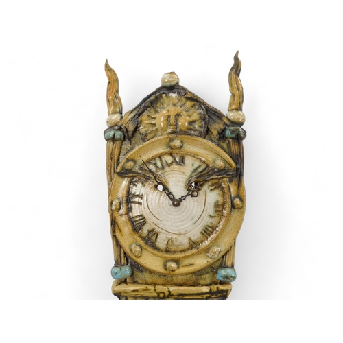 188 - A contemporary pottery clock - in the stylised form of a longcase, constructed in three sections, 15... 