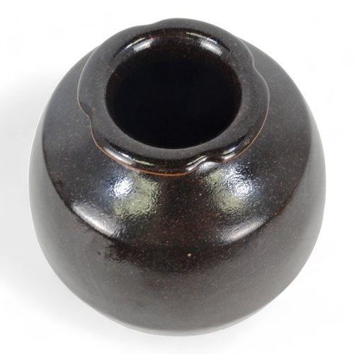 191 - A contemporary pottery vase - brown glazed with faint sgraffito design, 18cm high.