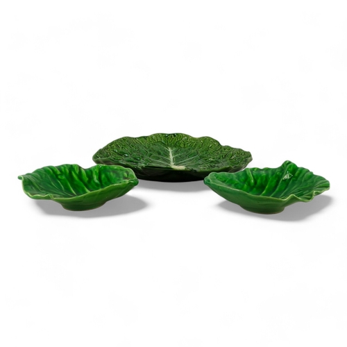 196 - A large cabbage leaf dish - 39cm wide, together with two further smaller dishes.