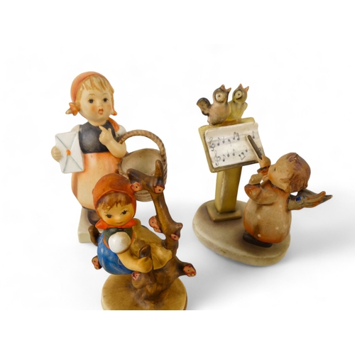 199 - Six various Goebel Hummel figures - standing in a variety of poses. (6)