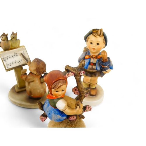 199 - Six various Goebel Hummel figures - standing in a variety of poses. (6)