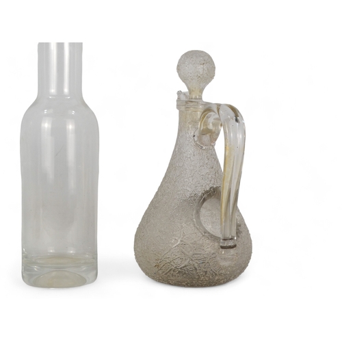 206 - A Dartington Crystal decanter - of plain square form, 22cm high, boxed, together with a water carafe... 