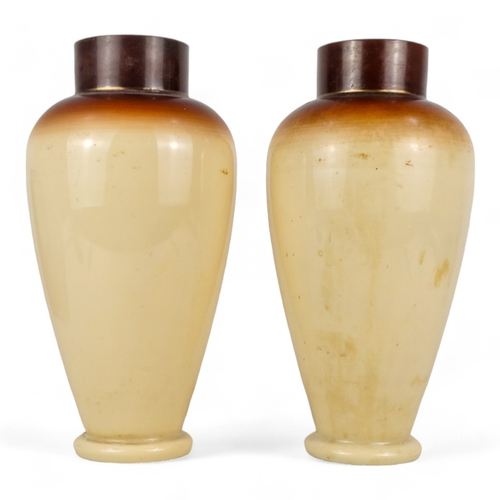 212 - A pair of Aesthetic Movement glass vases - decorated with flowers and butterflies, height 32cm.