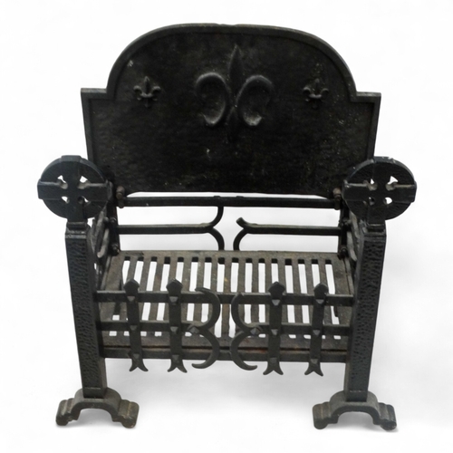 25 - A rectangular fire grate - with an openwork basket and a cast iron fire back decorated with a fleur ... 