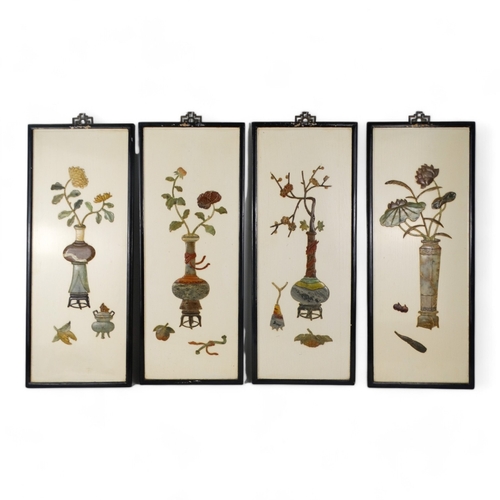 273 - Four 20th century oriental hardstone panels - rectangular showing vases of flowers, 63 x 25cm. (4)