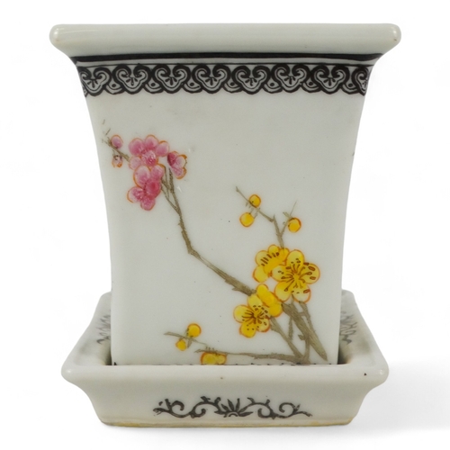 274 - A 20th century Chinese jardiniere - of tapered rectangular form decorated with birds and flowers, ra... 