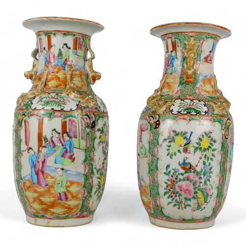 276 - A pair of 19th century Cantonese vases - of baluster form with famille verte decoration showing figu... 