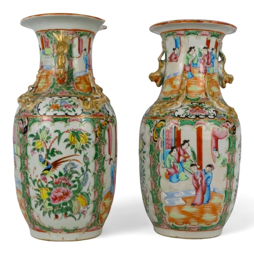 276 - A pair of 19th century Cantonese vases - of baluster form with famille verte decoration showing figu... 