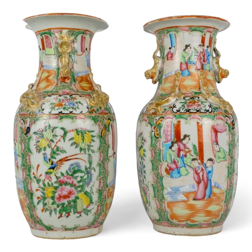 276 - A pair of 19th century Cantonese vases - of baluster form with famille verte decoration showing figu... 