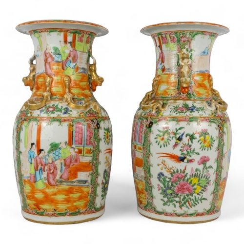 277 - A pair of 19th century Cantonese vases - of baluster form with famille verte decoration showing figu... 