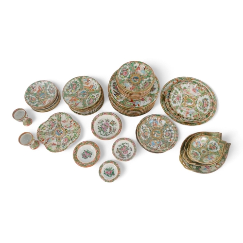 282 - A late 19th century quantity of Cantonese famille verte - mostly small dishes and saucers, including... 