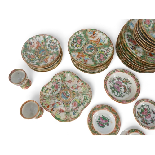 282 - A late 19th century quantity of Cantonese famille verte - mostly small dishes and saucers, including... 