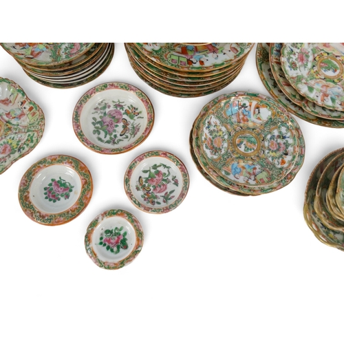 282 - A late 19th century quantity of Cantonese famille verte - mostly small dishes and saucers, including... 