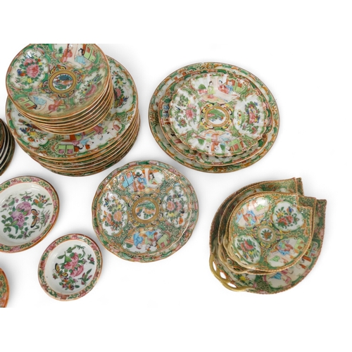 282 - A late 19th century quantity of Cantonese famille verte - mostly small dishes and saucers, including... 