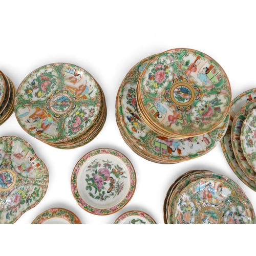 282 - A late 19th century quantity of Cantonese famille verte - mostly small dishes and saucers, including... 