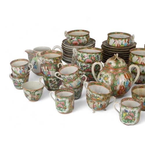 283 - A late 19th century quantity of Cantonese famille verte teawares - including a set of eight egg shel... 