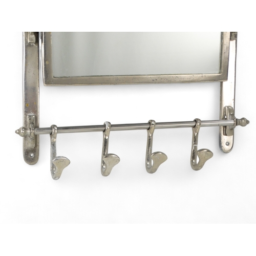 39 - A 20th century chrome mirrored hat and coat rack - of rail interest, with a narrow shelf, rectangula... 