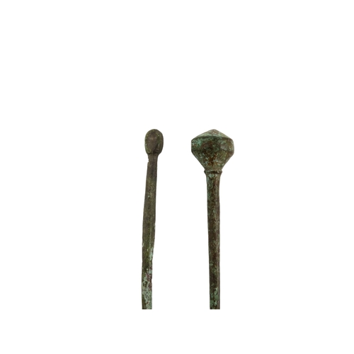 40 - A Romano-British bronze hair pin - 5cm long, together with another longer example. (2)